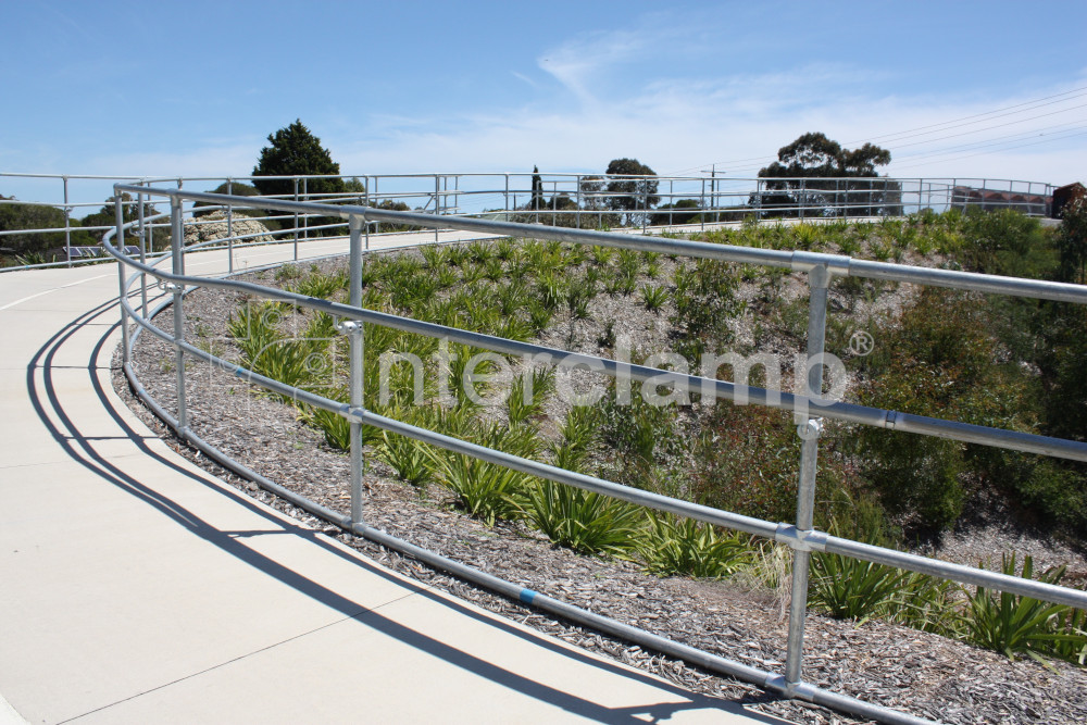 Curved section of handrail on cycle path, Peninsular Link, Melbourne